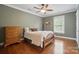 Charming bedroom with hardwood floors, a wooden bed frame, and a dresser at 725 Bradshaw Rd, Mt Ulla, NC 28125