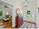 Bright foyer with hardwood floors, decorative rug, and decorative front door at 725 Bradshaw Rd, Mt Ulla, NC 28125