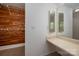 Walk-in closet with custom cedar paneling and shelving at 7309 Pebblestone Dr # D, Charlotte, NC 28212