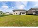 Large backyard features a well-manicured lawn with solar panels on the house enhancing the property's value at 7412 Greene Mill Sw Ave, Concord, NC 28025