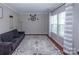 Cozy living room features neutral colors and modern furnishings at 7412 Greene Mill Sw Ave, Concord, NC 28025