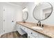 Bathroom with granite countertops, dual sinks, and modern fixtures at 781 Summerwood Dr, Rock Hill, SC 29732