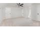 Large bedroom featuring carpet, a ceiling fan, and multiple doors at 781 Summerwood Dr, Rock Hill, SC 29732