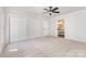 Bright bedroom featuring plush carpet, a ceiling fan, closets, and a bathroom at 781 Summerwood Dr, Rock Hill, SC 29732