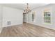 Dining room with hardwood floors, white trim and a chandelier at 781 Summerwood Dr, Rock Hill, SC 29732