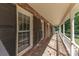 View of the home's porch with brick flooring and white railing at 781 Summerwood Dr, Rock Hill, SC 29732