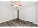 Bedroom showcases flooring and two doors at 7905 Quail Field Dr, Charlotte, NC 28227