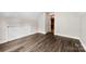 Attic bedroom with hardwood floors, storage space, and natural light at 7905 Quail Field Dr, Charlotte, NC 28227