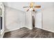 A bedroom with new flooring and a doorway at 7905 Quail Field Dr, Charlotte, NC 28227