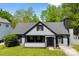 Charming one-story home featuring a cozy front porch and well-maintained landscaping at 7905 Quail Field Dr, Charlotte, NC 28227