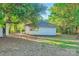 Exterior view of the home with a fenced backyard and storage shed at 828 Richard Ave, Kannapolis, NC 28081