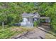 Quaint single-story home featuring a covered carport and porch area at 828 Richard Ave, Kannapolis, NC 28081