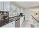 Modern kitchen features stainless steel appliances and gray countertops at 828 Richard Ave, Kannapolis, NC 28081