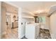 Laundry room with updated washer, dryer, and plenty of shelving space at 828 Richard Ave, Kannapolis, NC 28081