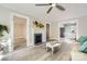 Open living room view includes a fireplace, door ways, and the kitchen at 828 Richard Ave, Kannapolis, NC 28081