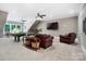 Finished basement with pool table, sitting area, and large screen television at 8670 Arbor Oaks Cir, Concord, NC 28027