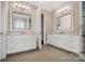 Bathroom with granite counters, dual vanities, and a glass shower at 8670 Arbor Oaks Cir, Concord, NC 28027