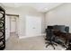 Comfortable office space with a desk and computer, flooded with natural light at 8670 Arbor Oaks Cir, Concord, NC 28027