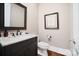 Stylish powder room with granite countertop and modern fixtures at 8670 Arbor Oaks Cir, Concord, NC 28027