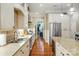 Well-equipped kitchen featuring stainless steel appliances, granite countertops, and ample cabinet space at 9652 Wheatfield Rd, Charlotte, NC 28277