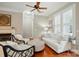 Comfortable living room with fireplace, crown molding, and natural light at 9652 Wheatfield Rd, Charlotte, NC 28277
