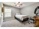 Bedroom with carpet flooring, a ceiling fan, and a window at 1006 Chambers Rd, York, SC 29745