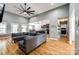 Open-concept living room featuring a large sectional sofa, high ceilings, and hardwood floors at 1006 Chambers Rd, York, SC 29745