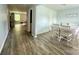 Inviting dining room featuring lovely flooring and ample natural light for a comfortable dining experience at 1070 Glenbriar Ct, Woodleaf, NC 27054