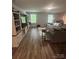 Spacious living room with entertainment center, ideal for relaxation and entertainment at 1070 Glenbriar Ct, Woodleaf, NC 27054