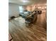 Open concept living room flowing into the kitchen, perfect for entertaining and Gathering time at 1070 Glenbriar Ct, Woodleaf, NC 27054