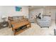 Bonus room featuring an adjacent exercise area, comfortable seating, and neutral paint at 11062 Discovery Nw Dr, Concord, NC 28027