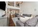 Inviting living room with tall ceilings, hardwood floors, and open layout to the kitchen and dining area at 11062 Discovery Nw Dr, Concord, NC 28027