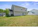 Exterior view of backyard with a well-maintained lawn and siding of home at 118 Maplecrest Dr, Kings Mountain, NC 28086