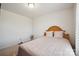 Simple bedroom featuring bed, nightstand, neutral walls, carpet flooring and bright window at 118 Maplecrest Dr, Kings Mountain, NC 28086