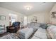 Comfortable living room featuring a large sofa and plush armchair at 118 Maplecrest Dr, Kings Mountain, NC 28086