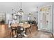 Open-concept dining area adjacent to the kitchen and living room provides seamless flow at 12604 Congregation Dr, Charlotte, NC 28278