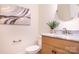 Stylish half-bathroom featuring modern fixtures, marble countertop, and elegant decor at 131 High Lake Dr, Statesville, NC 28677