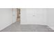 This bedroom features neutral paint and carpet, as well as a closet at 139 Satchel Ct, Mooresville, NC 28115