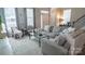 Comfortable living room with a gray sectional sofa, modern coffee table, and stylish accents at 1424 South St, Cornelius, NC 28031