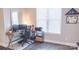 Home office space with a wood desk and a comfortable office chair at 1424 South St, Cornelius, NC 28031