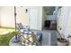 Outdoor patio features chairs and an umbrella, providing a cozy relaxation spot at 1424 South St, Cornelius, NC 28031