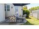 Outdoor patio with patio furniture, a table, and a black umbrella at 1424 South St, Cornelius, NC 28031