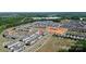 An aerial view of townhomes in a planned community with upcoming construction and scenic surroundings at 147 Morning Gap Pkwy, Fort Mill, SC 29715
