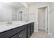 Well-lit bathroom with double vanity sinks and modern fixtures at 147 Morning Gap Pkwy, Fort Mill, SC 29715