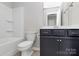 Bathroom featuring a shower-tub combo and modern vanity at 147 Morning Gap Pkwy, Fort Mill, SC 29715