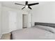 A bedroom with modern ceiling fan and neutral decor at 147 Morning Gap Pkwy, Fort Mill, SC 29715