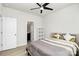 A clean bedroom with a ceiling fan, featuring neutral colors and a bright ambiance at 147 Morning Gap Pkwy, Fort Mill, SC 29715