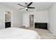 A cozy bedroom features a modern ceiling fan and neutral decor at 147 Morning Gap Pkwy, Fort Mill, SC 29715