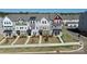 Aerial shot of colorful modern townhomes with well-manicured lawns at 147 Morning Gap Pkwy, Fort Mill, SC 29715