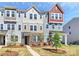 Well-maintained townhouse complex with a variety of exterior finishes and tidy landscaping at 147 Morning Gap Pkwy, Fort Mill, SC 29715